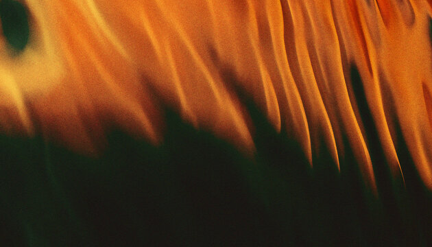 Warm orange and black colors with wavy patterns or radial distortions that give a dynamic and organic feel. The prominent grain texture gives a retro or lo-fi aesthetic that is often used in modern gr