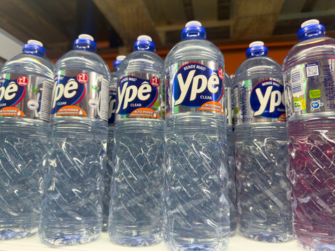 BELO HORIZONTE, MG, BRAZIL, APRIL 11, 2026 A slightly different low-angle perspective showcasing an organized row of Ype brand bottled drinking water on a retail shelf.