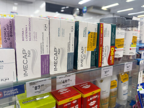 BELO HORIZONTE, MG, BRAZIL, APRIL 11, 2026 A pharmaceutical shelf displays several boxes of IMEcap hair supplements, highlighting hair care and wellness products.