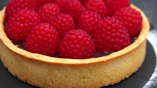 beautiful tasty tart with raspberries and chocolate in flaky crust close up macro photography delicious dessert postre cafe restaurant antigua guatemala pastry treat