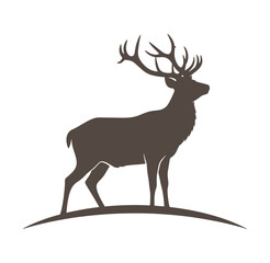Fototapeta premium Elk silhouette standing on a hill with large antlers profile view