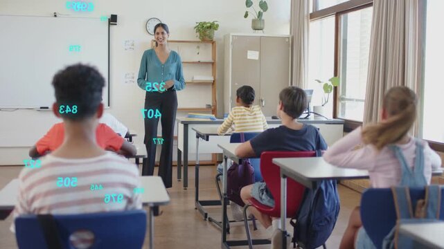 Teacher speaking, gesturing, creating overlays with turquoise numbers and purple squares for lesson
