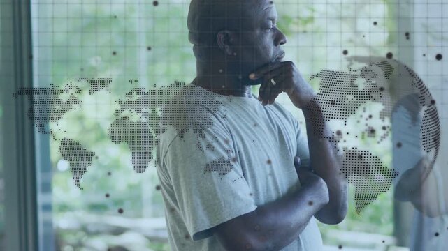 Senior man standing at glass, camera shifting, turning head, dotted map aligning, studying design