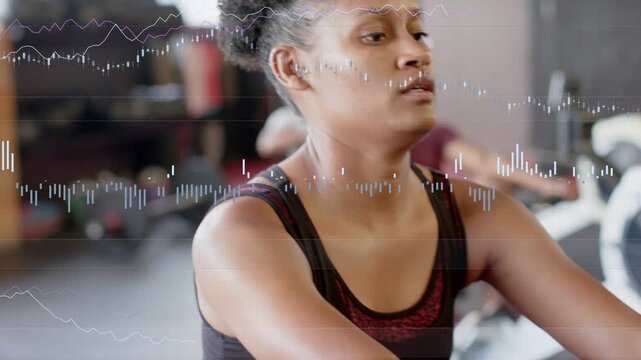 Woman rowing on rower, camera cutting causing waveform bars to sync with strokes for fitness data