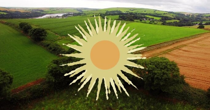 Displaying large stylized sun graphic covering rolling green pasture and golden field on farm