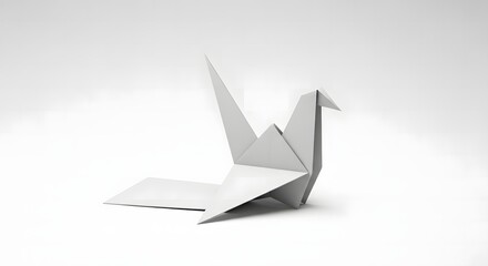 Naklejka premium Graceful white origami crane meticulously crafted from paper, symbolizing peace, hope, and traditional Japanese artistry, presented against a clean, minimalist studio background
