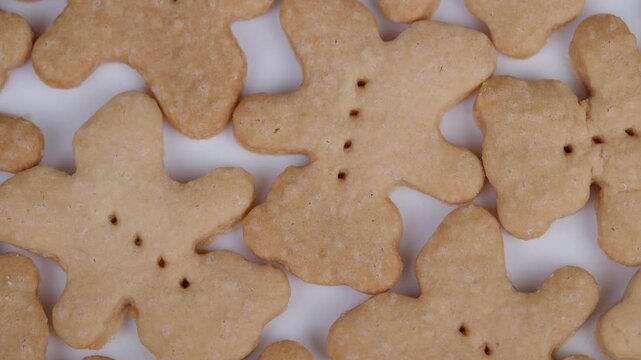 Homemade bear cookies display. Golden cookies with dotted details shown. Warm neutral photography capturing homemade bear cookies ideal for packaging designs and branding