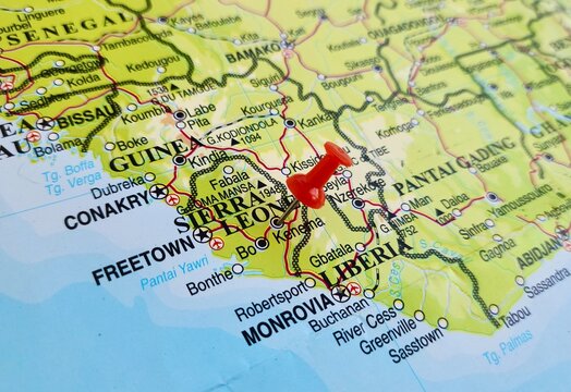 View of Sierra Leone, officially the Republic of Sierra Leone, is a country on the west coast of West Africa, on a geographical map of Africa, marked with red push pin