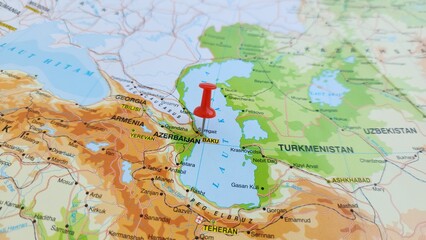 Obraz premium View of Baku, is the capital and largest city of Azerbaijan, on a geographical map of Asia, marked with red push pin