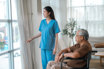 Obraz premium Caregiver with Asian senior patient, nurse helping elderly patient in home room