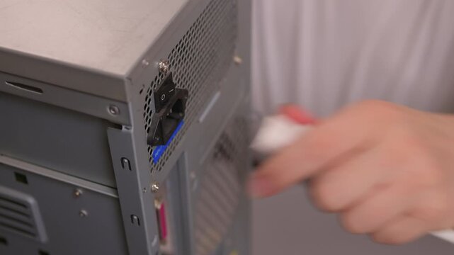 Properly attaching printer cable. Demonstrating correct method of cable attachment to USB port. Showing proper process for connecting printer cable to computer USB port
