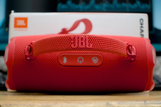 Zapopan Jalisco, Mexico - April 23, 2026: Red JBL Charge portable bluetooth speaker on desk, speaker concept