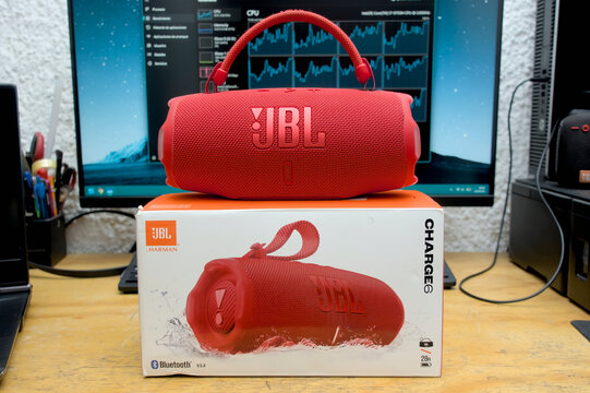 Zapopan Jalisco, Mexico - April 23, 2026: Red JBL Charge portable bluetooth speaker on desk, speaker concept