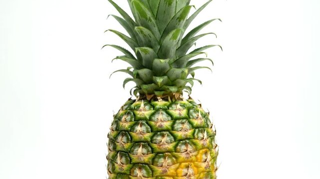 Fresh pineapple on white.