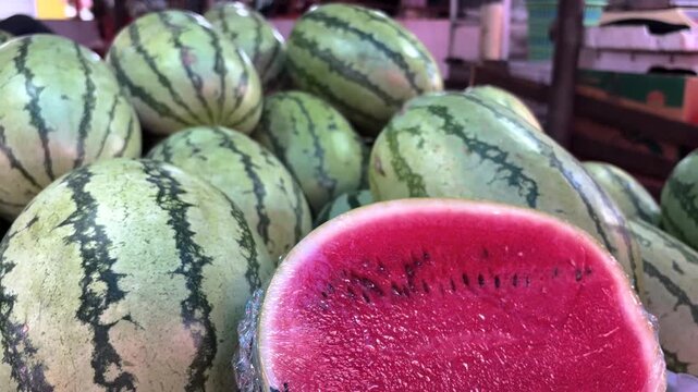 watermelons and melons in a traditional market