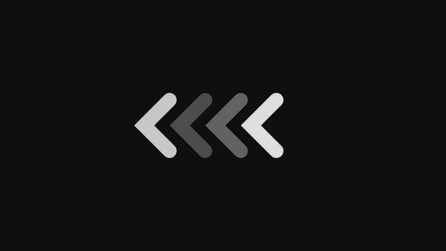 Animated white chevron arrows pointing left and flashing in a sequence as a loading indicator or directional signal.