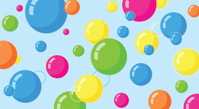 Colorful bubbles floating on light blue background