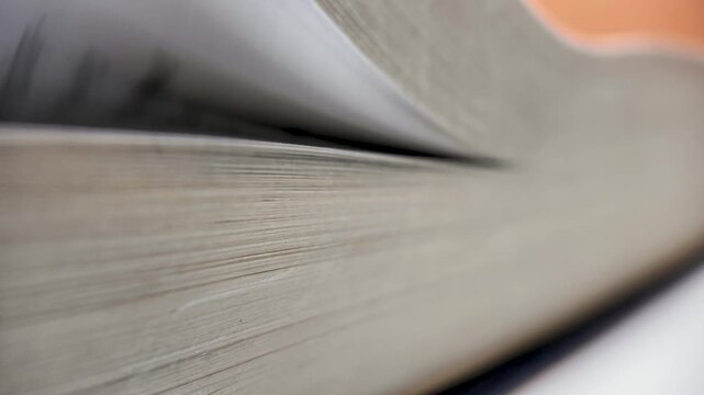 Close up of book pages turning rapidly