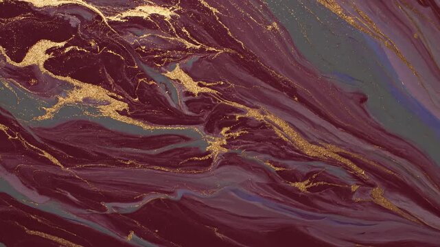Abstract fluid art in rich burgundy, gold, and blue, creating a mesmerizing pattern