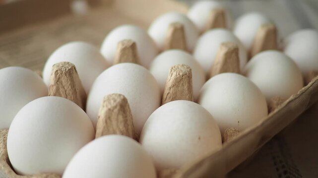 Fresh eggs in a carton ready for cooking and baking