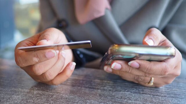 Payment process at a cafe with phone and card