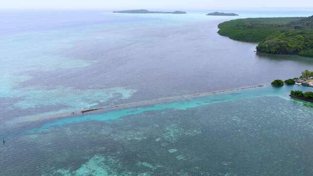 Aerial View of Tropical Island Coastline and Coral Reef in Palau