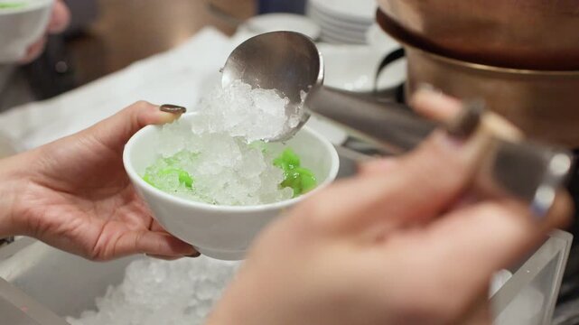 Serving Traditional Thai Lod Chong Dessert with Shaved Ice in Bangkok