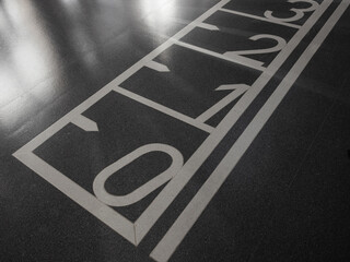 Obraz premium Agility ladder markings on gym floor for speed and footwork training drills