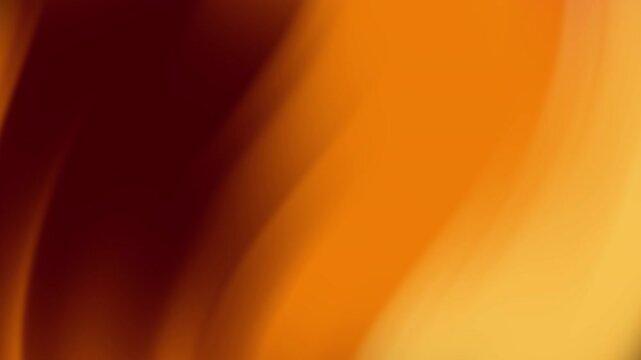Abstract warm flowing colors of orange and red hues suitable for backgrounds, logos, and design projects needing vibrant energy and warmth.