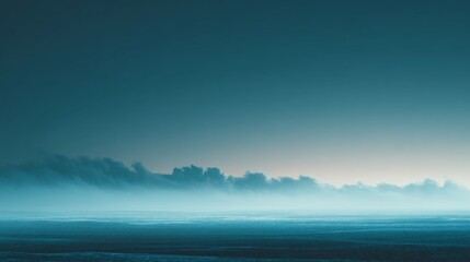 Fototapeta premium Serene Horizon with Atmospheric Fog Over an Empty Space at Dawn
