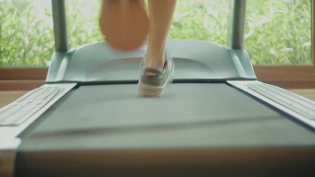 Athlete Training In Gym. Cardio Workout On Running Machine