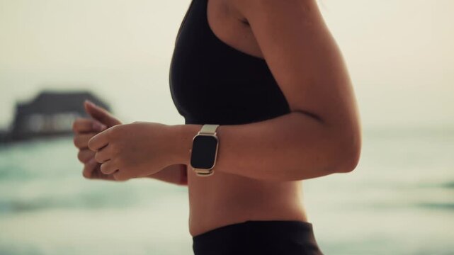 Woman Running on Beach. Training on Sea Shore During Morning Workout