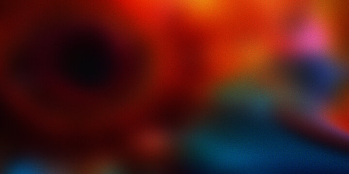 Vibrant abstract background with blurred gradient effect and noise texture