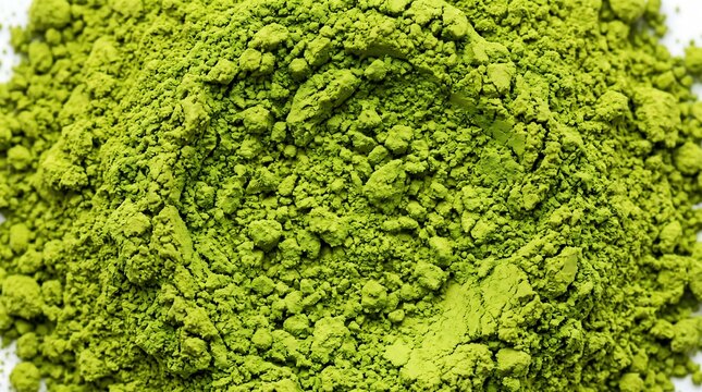 Bright green powdered matcha tea granules in close up view
