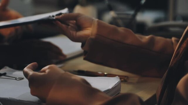 Business woman accountant working in office checking financial accounts and allocating company budgets.