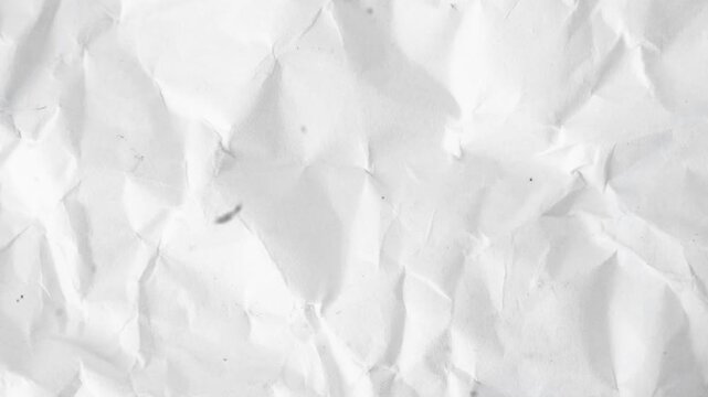 A close-up view of crumpled white paper texture
