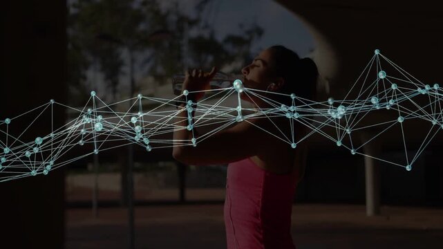 Woman lifting bottle and drinking for fitness under arch animated network overlaying midline health