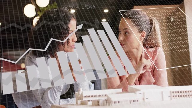 Two architects leaning over model, pointing, activating overlay charts over model, analyzing design
