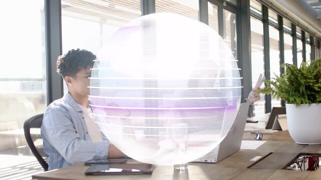 Left woman using laptop right peer tapping tab forming sphere obscuring staff showing business data