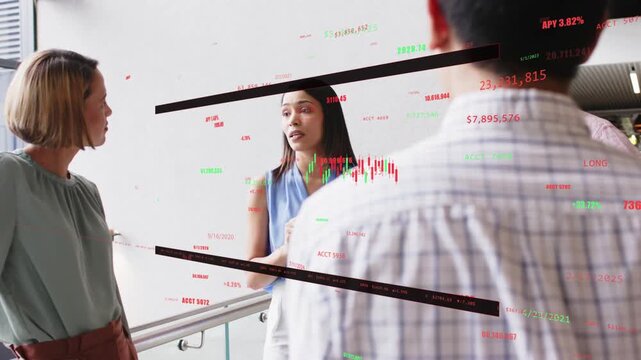 Camera pulling back revealing lead stepping, pointing tablet, explaining finance charts overlaying