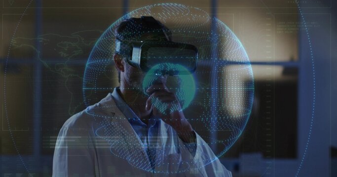 Adjusting scientist wearing VR headset and white lab coat in dim lab with holographic globe