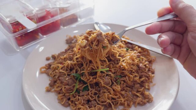 Thai Stir Fried Instant Noodles with Minced Pork Fork Lifting Steam Rising