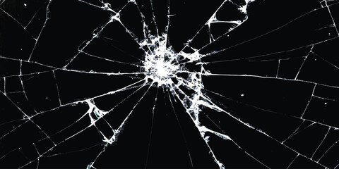 Fototapeta premium Broken glass texture with sharp cracks and spider web pattern on black background