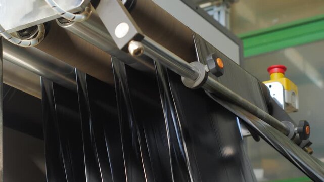Plastic bag recycling and production machine