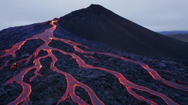 Volcanic eruption timelapse over mountain landscape