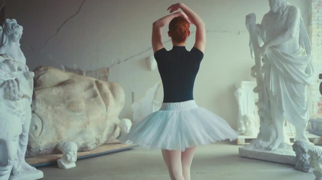 Graceful ballerina dancing alone in museum, back view, slow motion, female body. Talented dancer performing classical ballet choreography, modern dance performance, express yourself an emotions