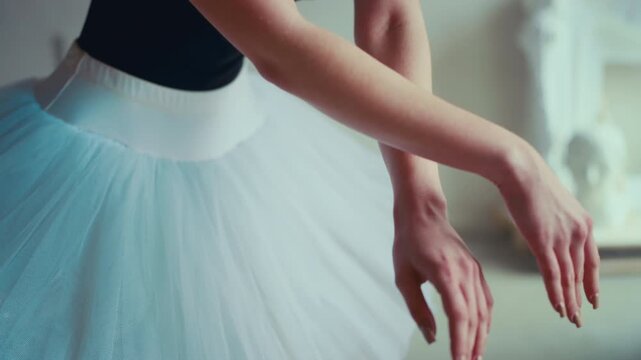 Inside ballet class, closeup view of female hands in movement, slow motion. Beautiful ballerina rehearsing and performing classical choreography by amazing music, self-expression and hobby, grace