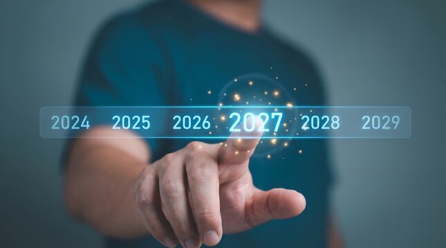 A man in a blue shirt interacting with a futuristic digital interface displaying the years 2024 to 2029