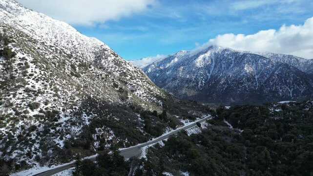 The Santa Ana River Valley in San Bernardio, California, after a winter storm near State Route 38 looking at the Road to Big Bear near Angelus Oaks 