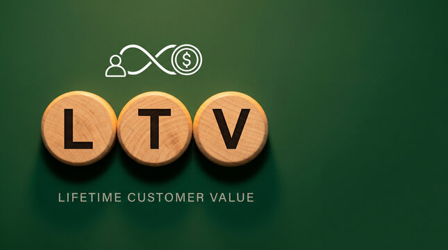 Three warm wood discs spelling LTV with a person-infinity-dollar icon above on a deep forest-green background for customer lifetime value metrics.